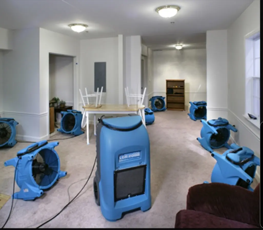 Air movers and dehumidifier setup for Water Extraction & Removal in LaBelle